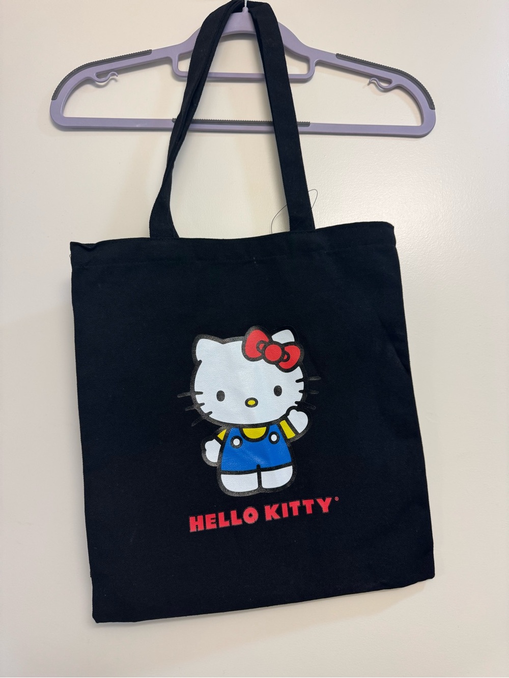Hello Kitty Black Tote with Red Bow and Blue Outfit